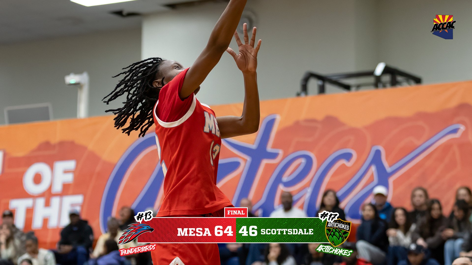 Lakeisha Robins lays the ball up in an MCC Women's Basketball game with the score graphic from MCC Women's Basketballs victory over Scottsdale. (64-46). PC: Stephanie van Latum