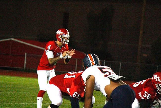 Austin Apodaca threw a school-record six TD passes (Photo by Jacob Dewal)