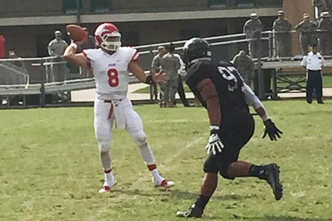 Brennen Dobson attempts a pass at New Mexico Military Institute(photo by Marty Parel)