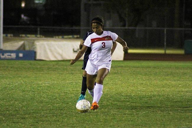 Elly Carpio dribbles down field against Pima Tuesday night.